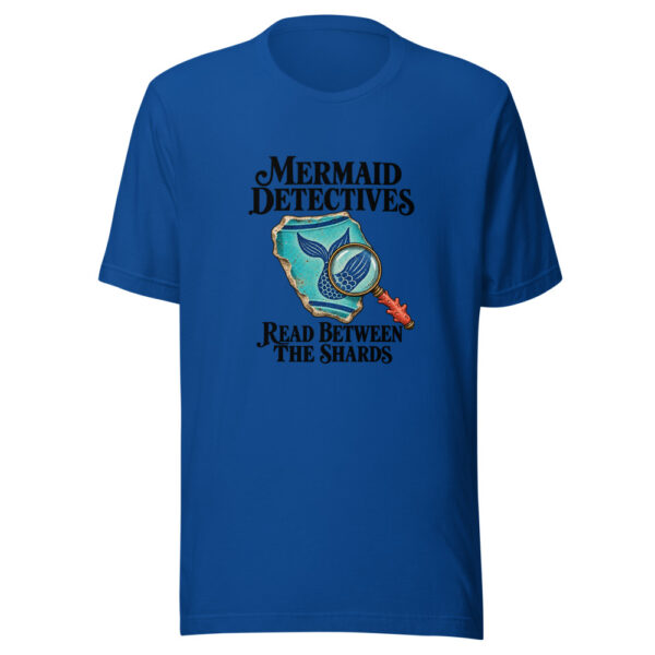 Mermaid Detectives Read Between The Shards Graphic Tee mockup 3 Mermaid Detectives Read Between The Shards Graphic Tee mockup 3