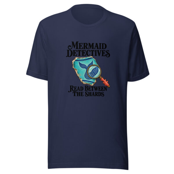 Mermaid Detectives Read Between The Shards Graphic Tee mockup 6 Mermaid Detectives Read Between The Shards Graphic Tee mockup 6