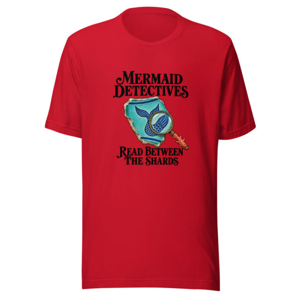 Mermaid Detectives Read Between The Shards Graphic Tee mockup 8 Mermaid Detectives Read Between The Shards Graphic Tee mockup 8